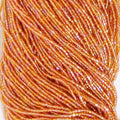 Czech Seed Bead 3Cut 10/0 Transparent Dark Topaz Rainbow Strung Hank