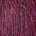Czech Seed Beads 9/0 3Cut Transparent Red Iris Strung hank