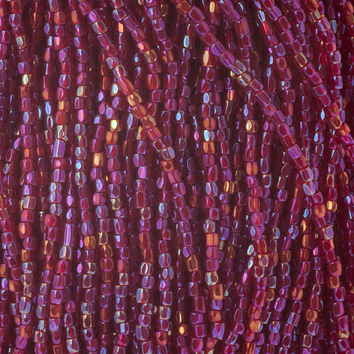 Czech Seed Beads 9/0 3Cut Transparent Red Iris Strung hank