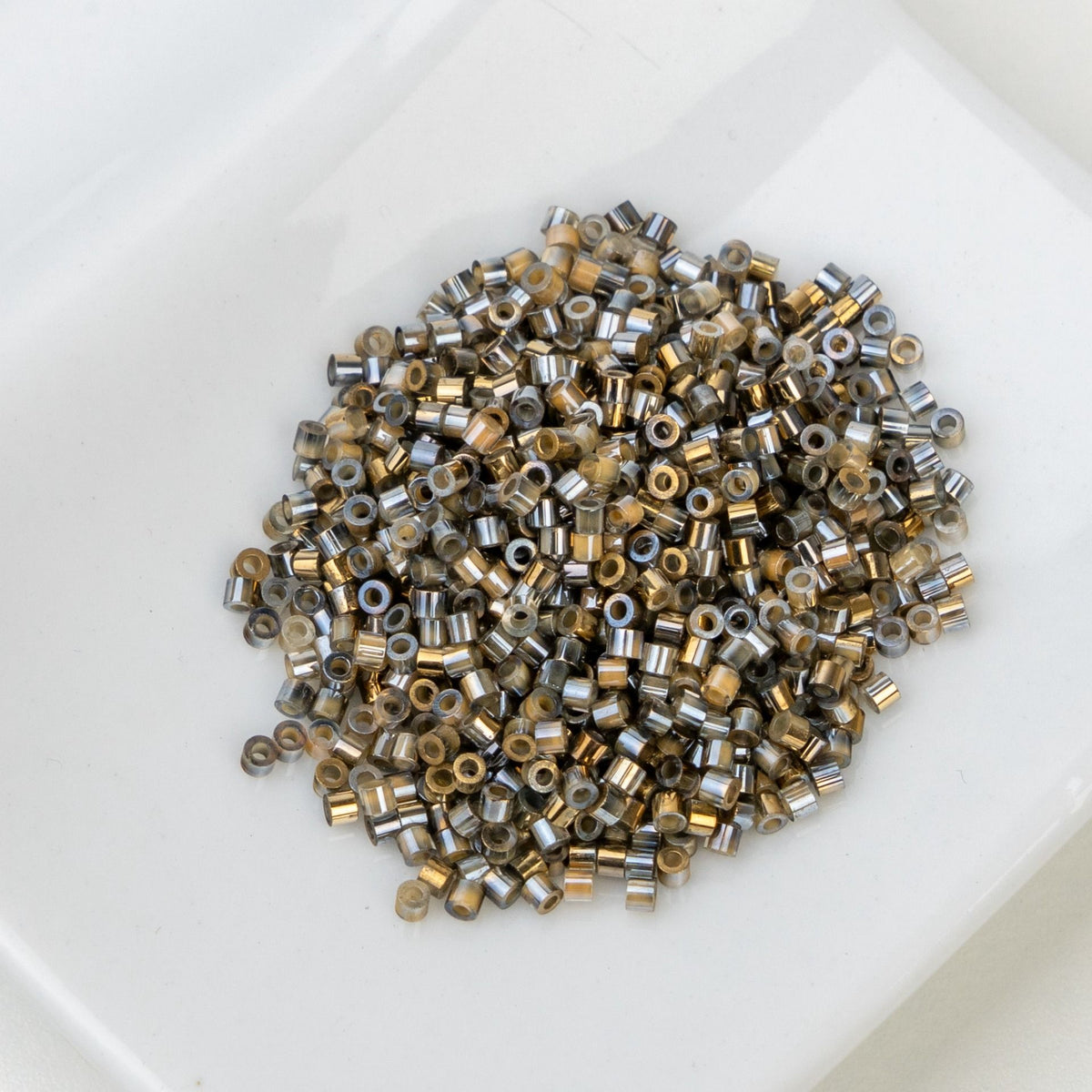Cylin Bead 11/0 25g Bag Gilded Halo Champagne