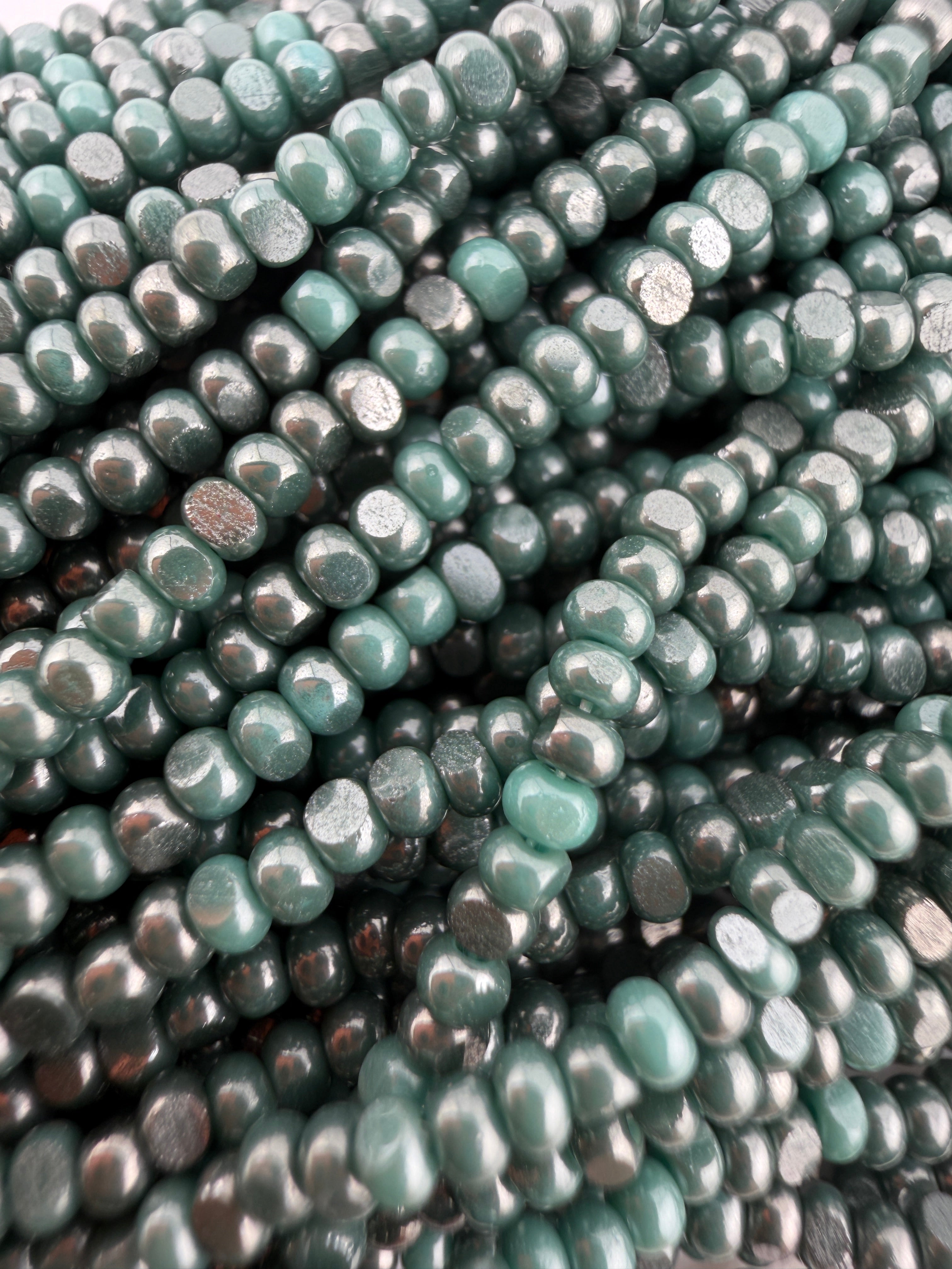 11/0 Sheen Chartlotte 2-Cut Ionized Opaque Aqua Green Hank