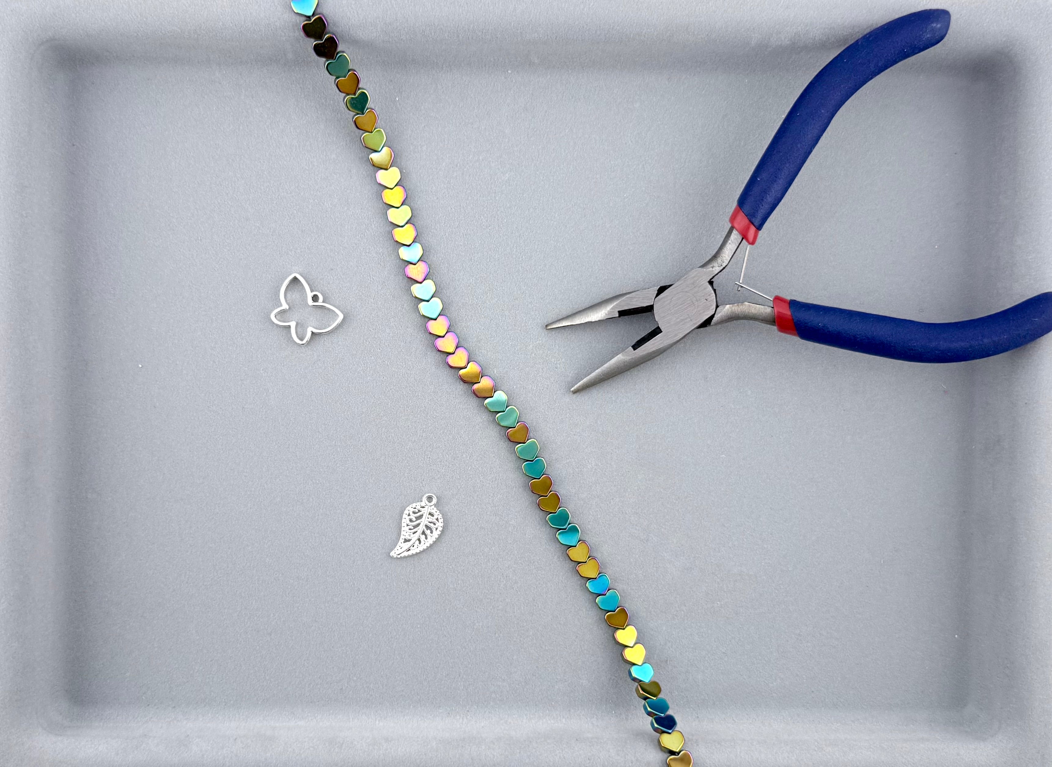 2.5x6mm Hematite Flat Heart Rainbow