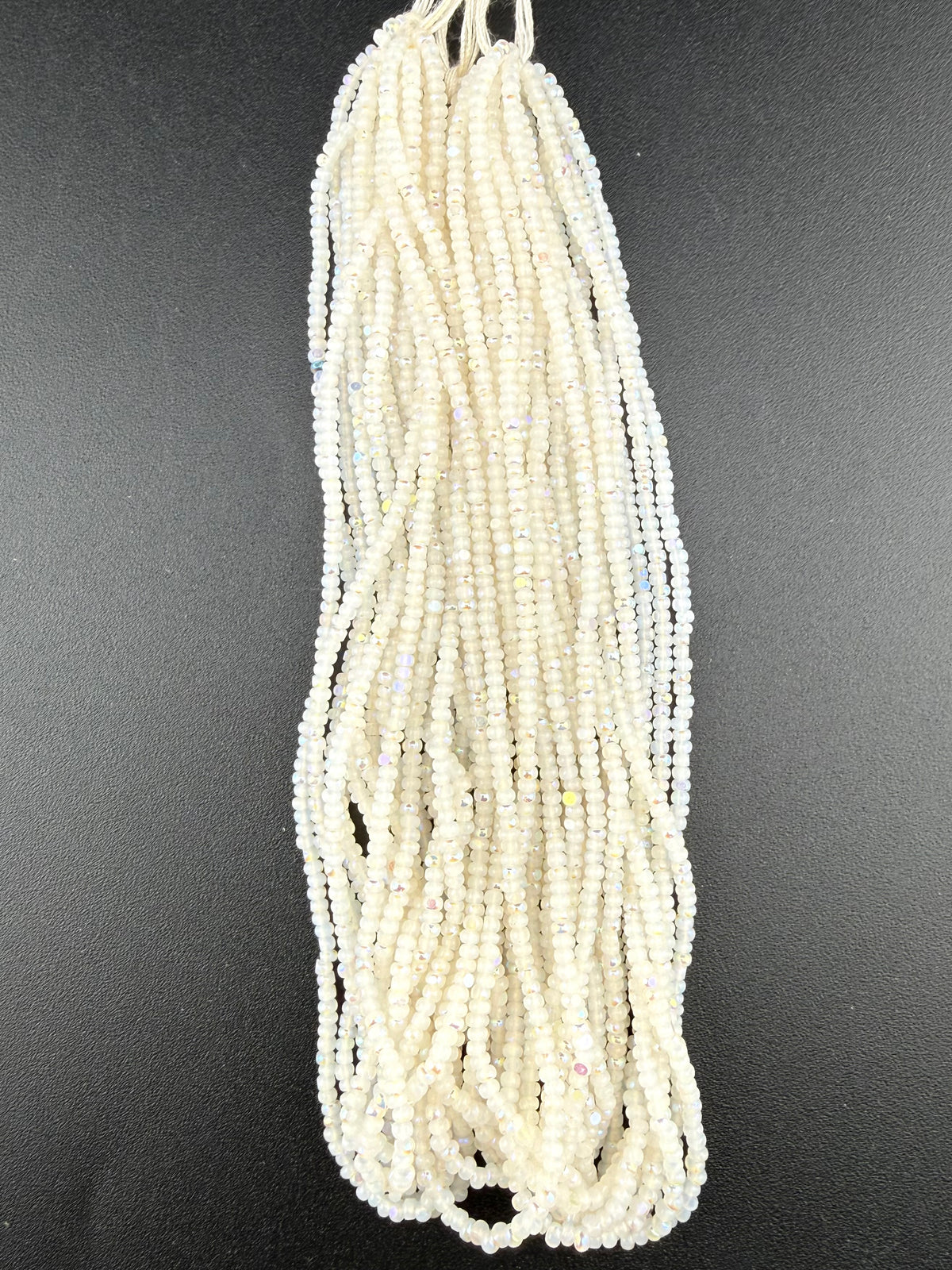 11/0 Sheen Chartlotte 2-Cut Patina White Opal AB