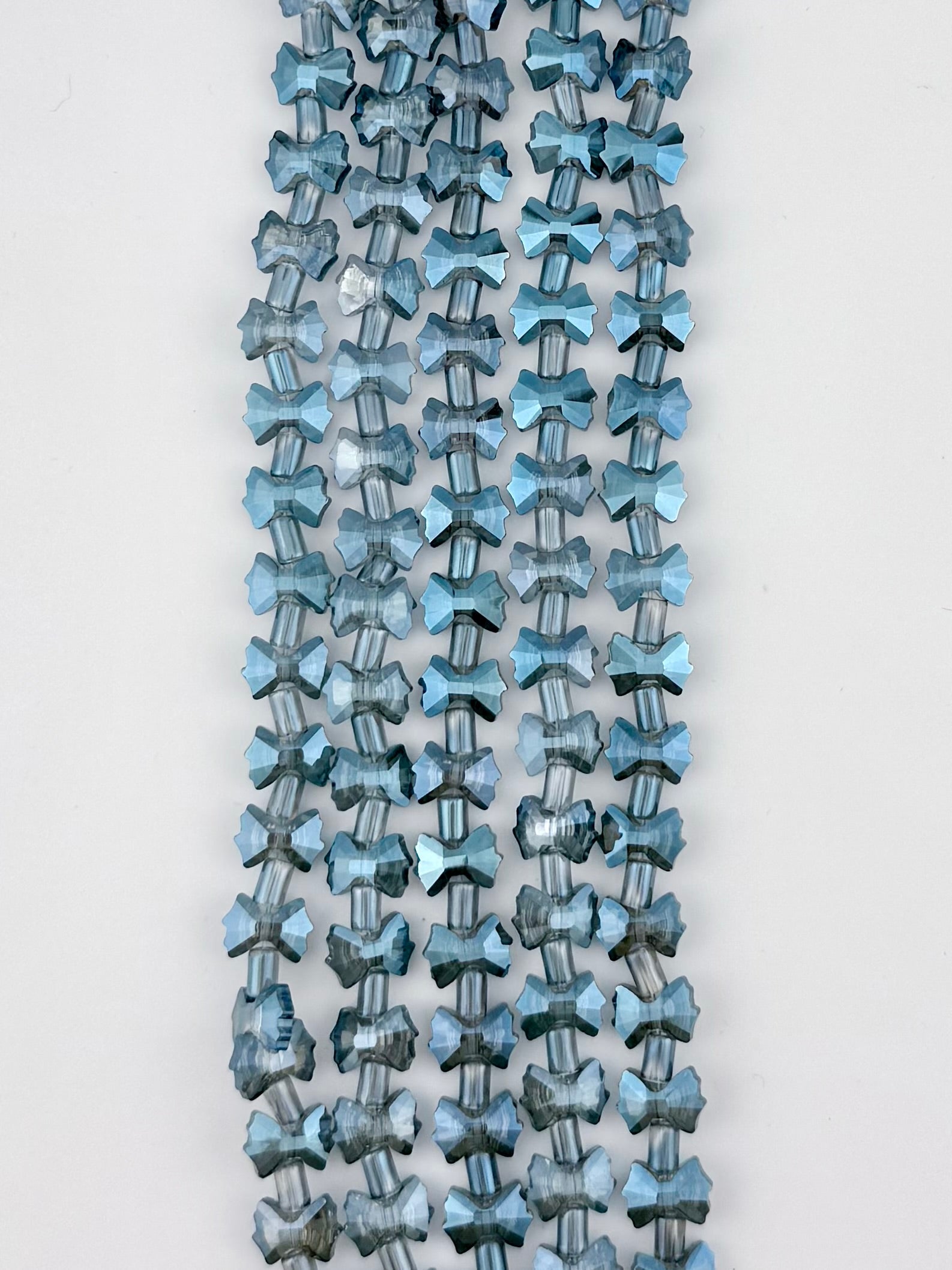 7-10mm Faceted Glass Butterfly Beads Blue