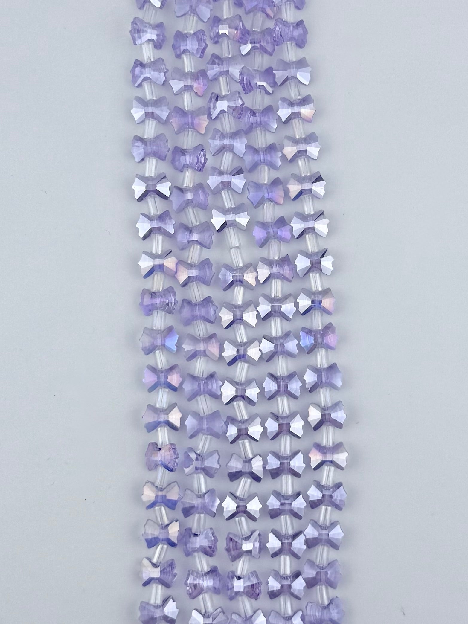 7-10mm Faceted Glass Butterfly Beads Purple