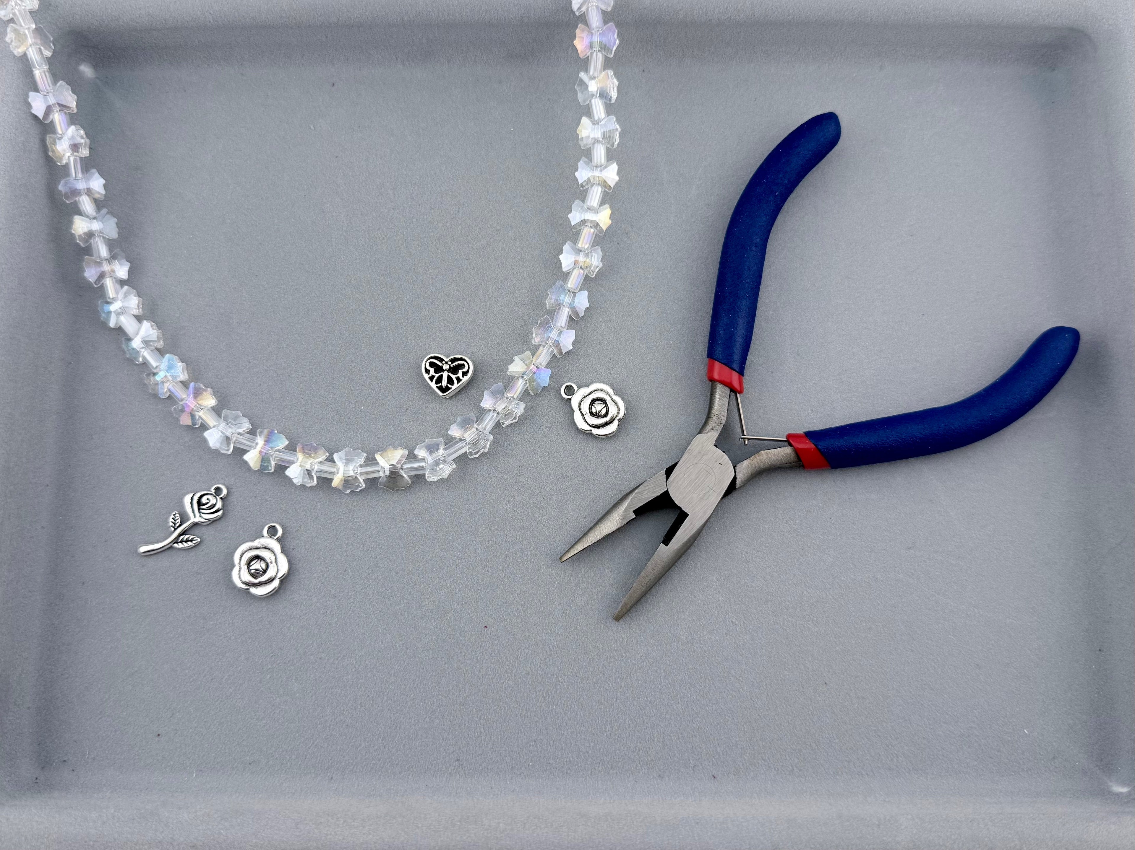 7-10mm Faceted Glass AB Butterfly Beads