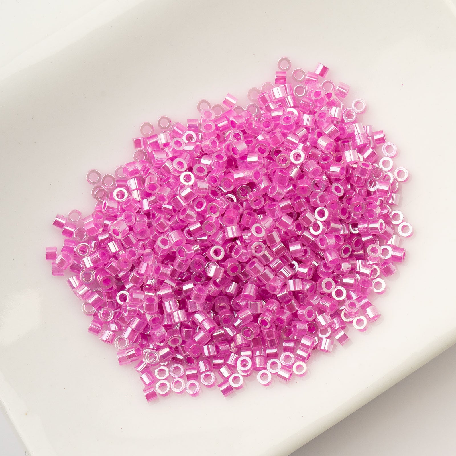 Cylin Bead 11/0 25g Bag Crystal Fuchsia Lined Ceylon