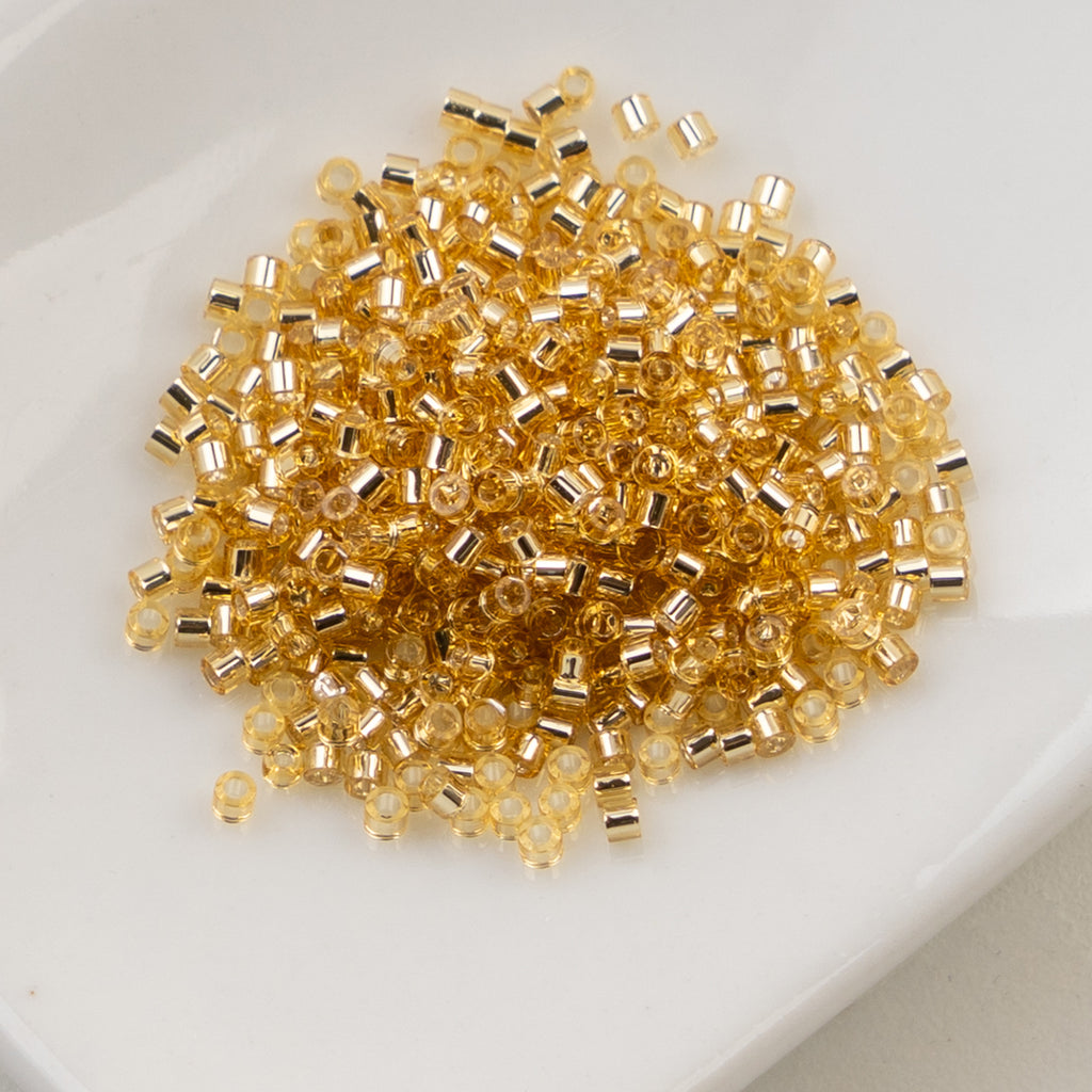 Cylin Bead 11/0 25g Bag Gold S/L